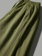 Green pants on a gray background